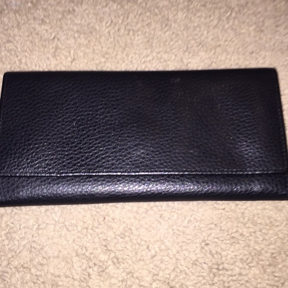 Black faux leather wallet.